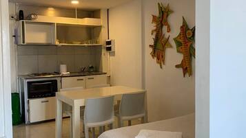Apartment, 1 Bedroom, Kitchenette (Terrace) | Living area | 32-inch flat-screen TV with cable channels, LCD TV