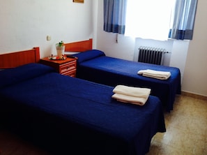 Desk, blackout curtains, free cots/infant beds, free WiFi