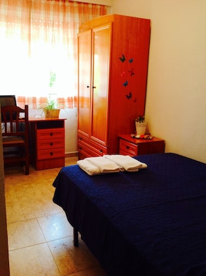 Desk, blackout curtains, free cots/infant beds, free WiFi