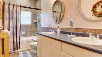 Combined shower/tub, jetted tub, designer toiletries, hair dryer