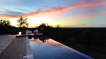 Outdoor pool, pool umbrellas, pool loungers
