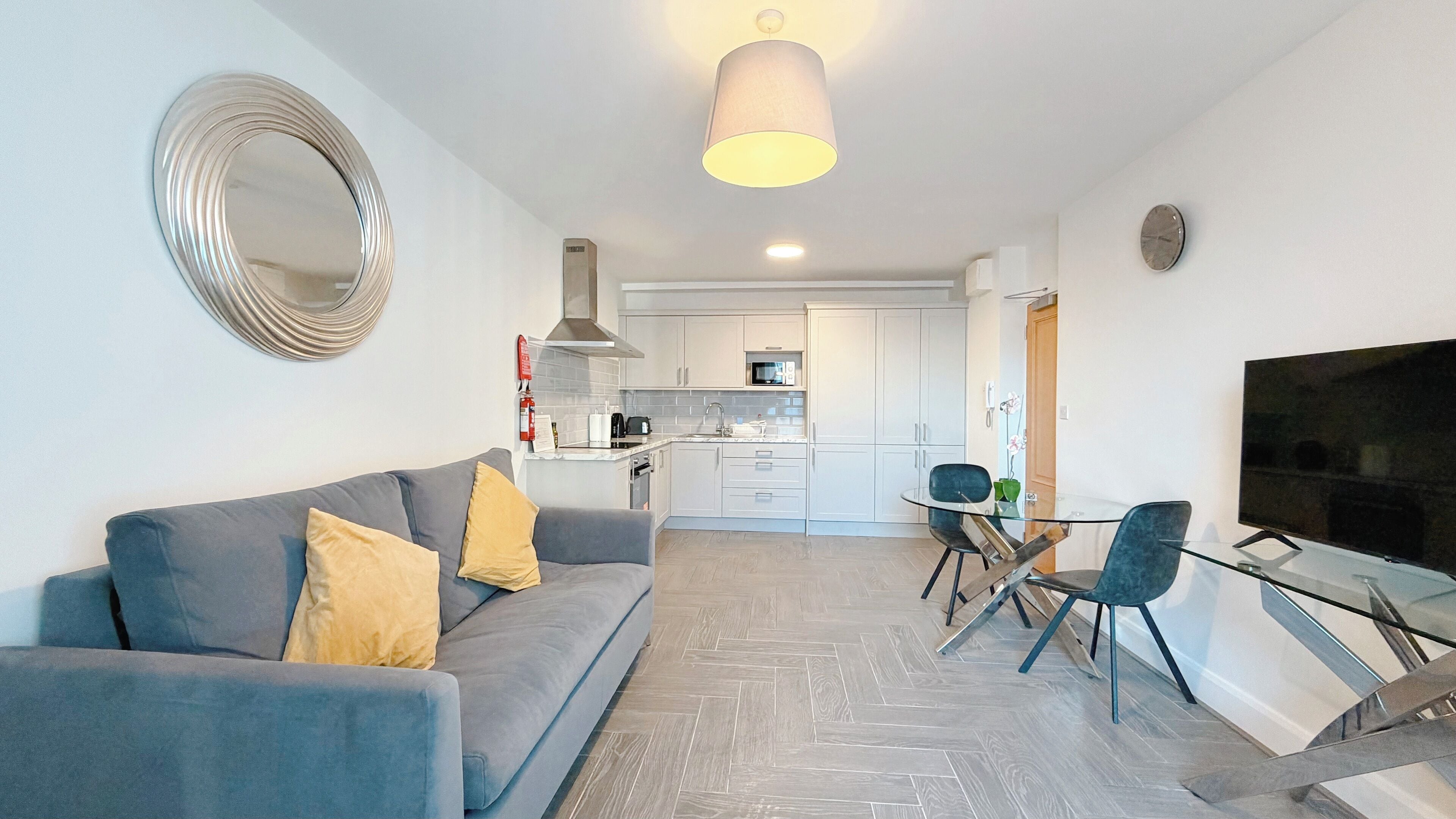 Apartment, 1 Bedroom | Living area | 42-inch Smart TV with cable channels