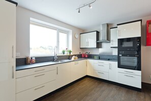 Luxury Penthouse, 2 Bedrooms, Terrace, City View | Private kitchen | Fridge, microwave, stovetop, coffee/tea maker