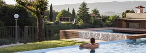 Seasonal outdoor pool, pool umbrellas, pool loungers
