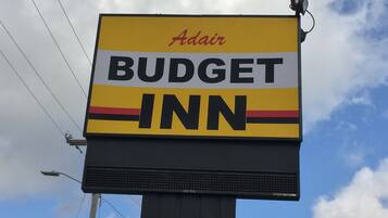 A billboard for Adair Budget Inn.