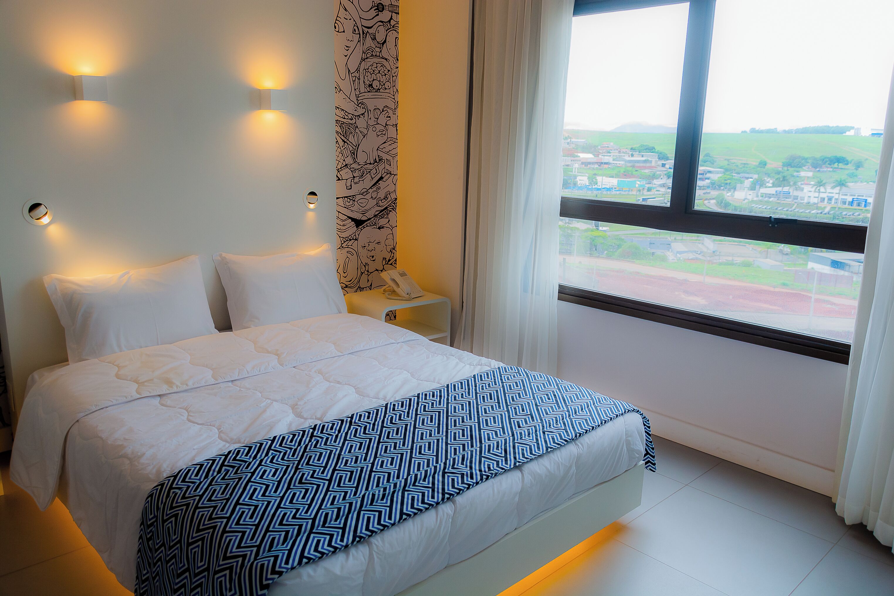 Quarto premium, 1 cama de casal | Escrivaninha, Wi-Fi de cortesia, roupa de cama