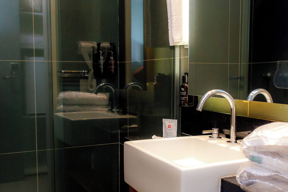 shower, eco-friendly toiletries, towels