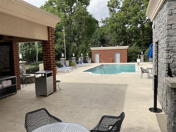 Seasonal outdoor pool, open 8:00 AM to 10:00 PM, pool umbrellas