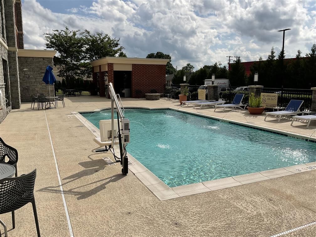 seasonal outdoor pool, open 8:00 am to 10:00 pm, pool umbrellas