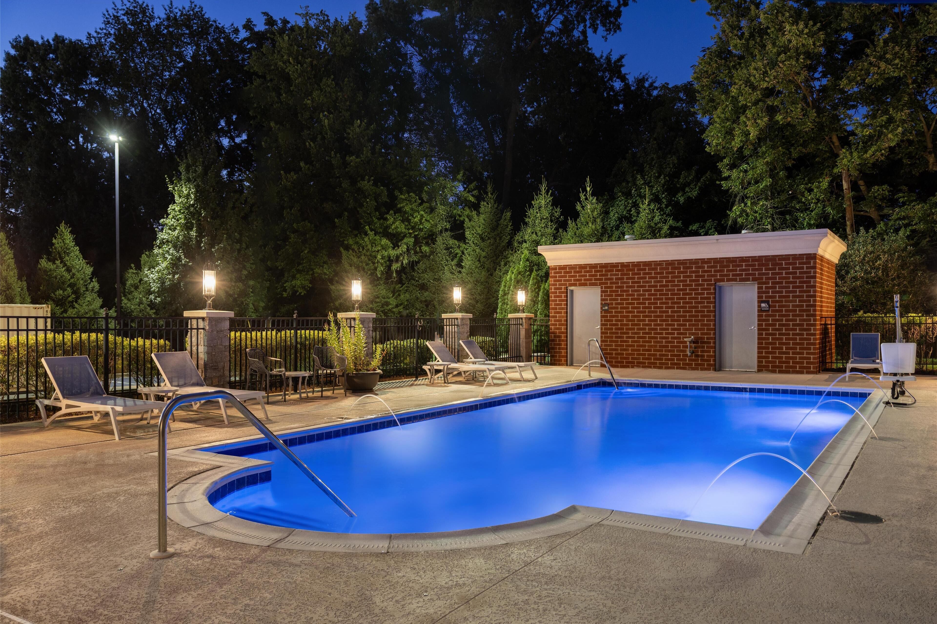 seasonal outdoor pool, open 8:00 am to 10:00 pm, pool umbrellas