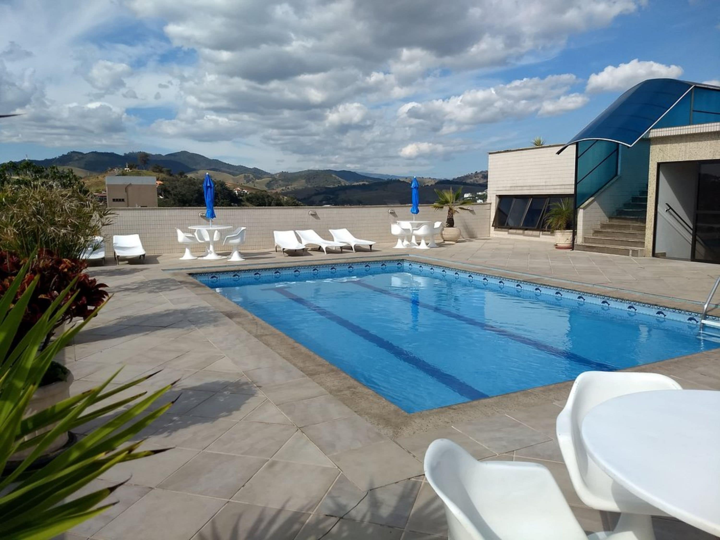 outdoor pool, pool loungers