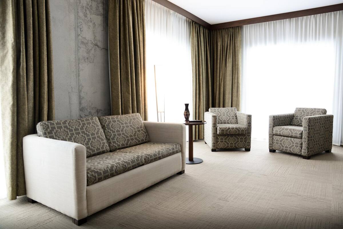 suite, 1 king bed with sofa bed | living room | 40-inch flat-screen tv with premium tv channels, tv