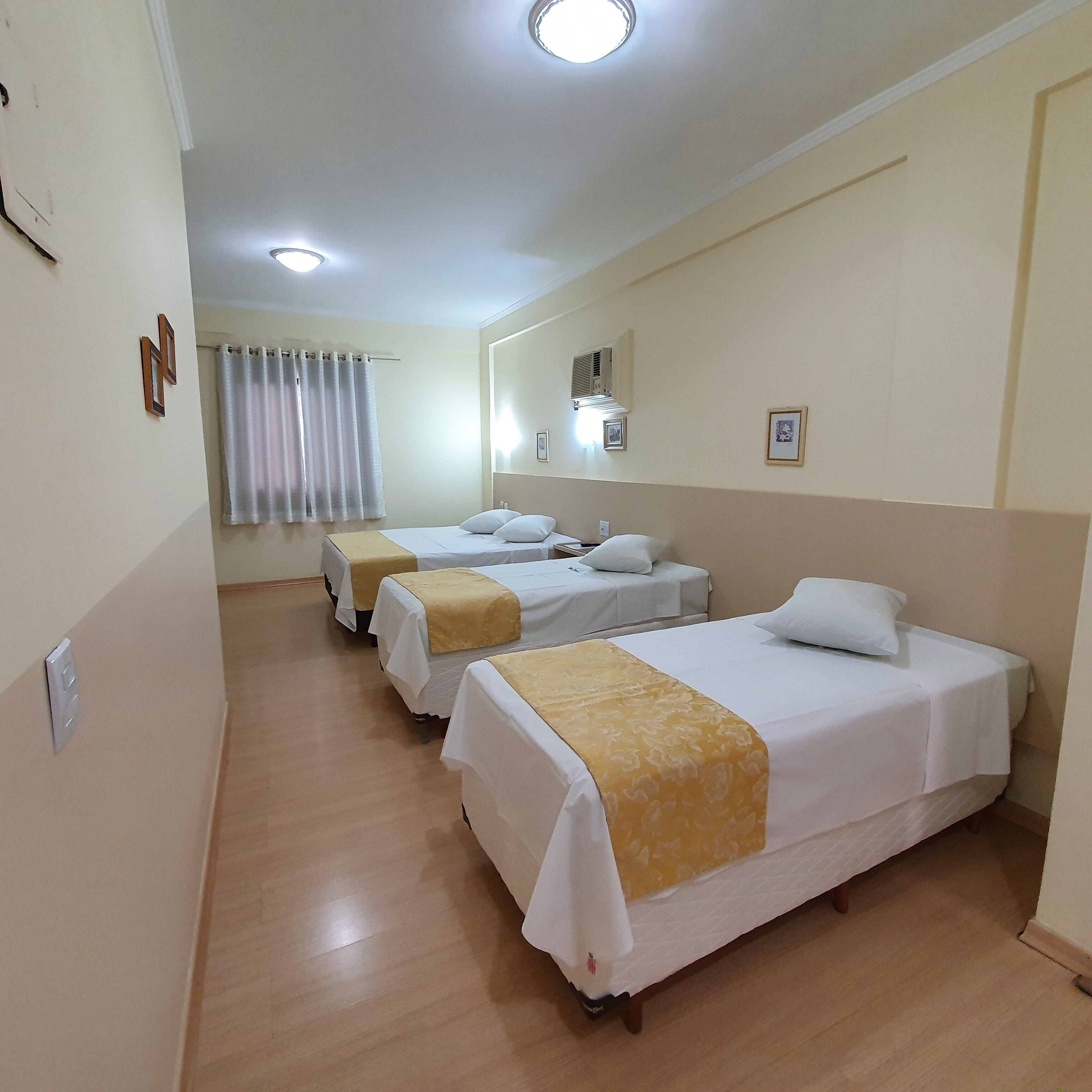 deluxe quadruple room, 1 bedroom | minibar, in-room safe, desk, blackout curtains