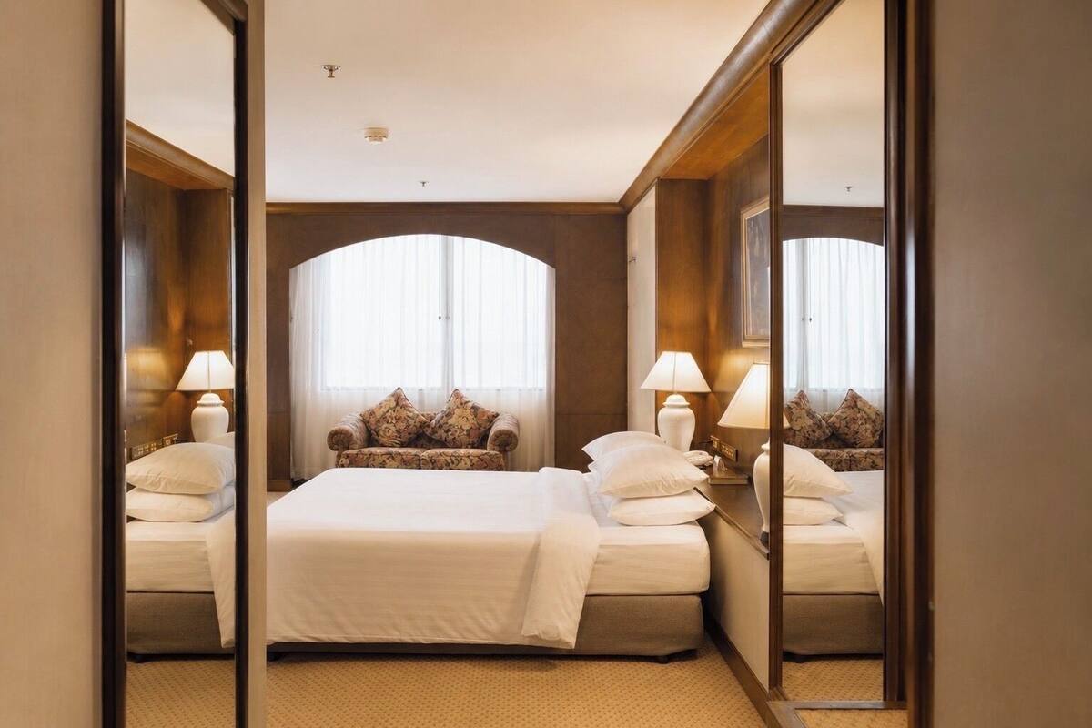 Suite ejecutiva | Ropa de cama hipoalergénica, minibar, caja fuerte y escritorio