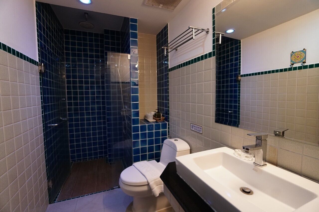 family room  | bathroom | shower, rainfall showerhead, free toiletries, hair dryer
