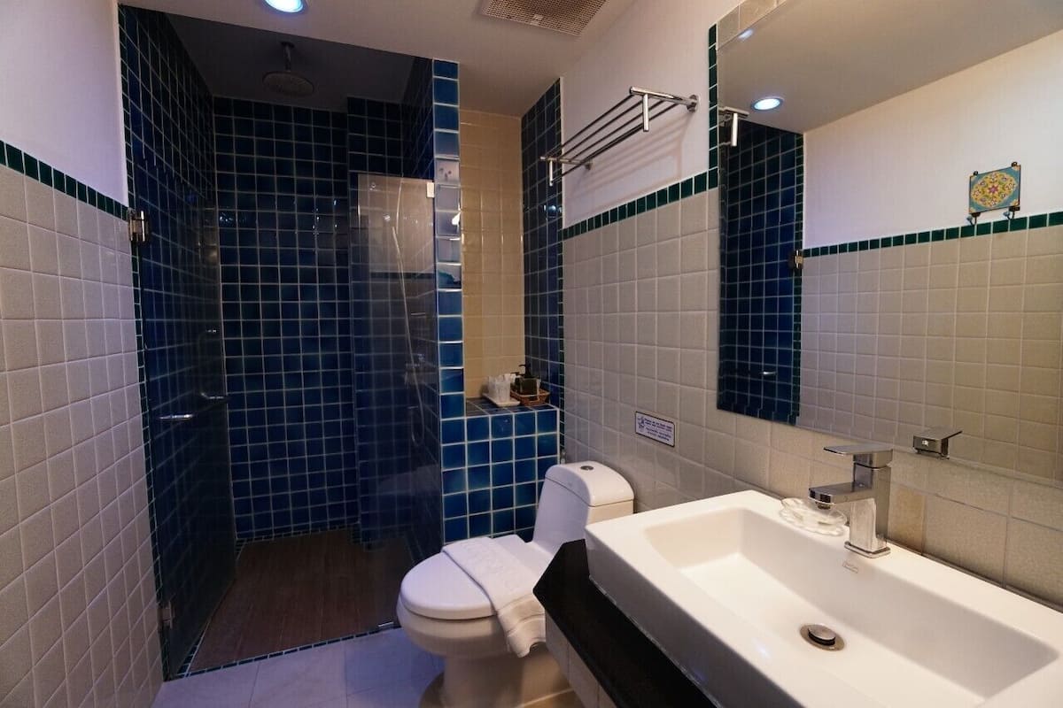 family room  | bathroom | shower, rainfall showerhead, free toiletries, hair dryer