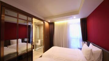 Premium bedding, in-room safe, desk, soundproofing
