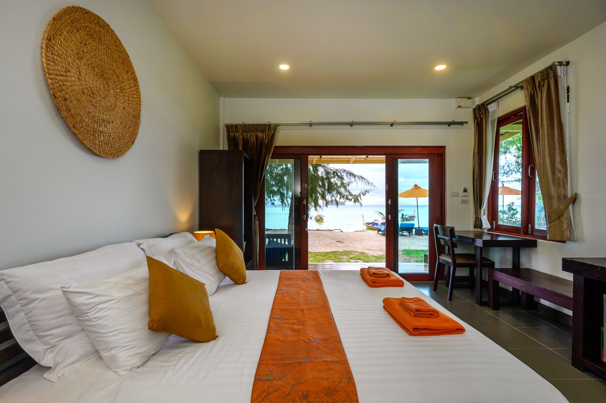 Beachfront Bungalow | In-room safe, individually decorated, individually furnished, desk