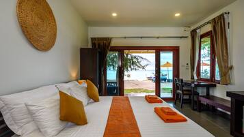 Beachfront Bungalow | In-room safe, individually decorated, individually furnished, desk