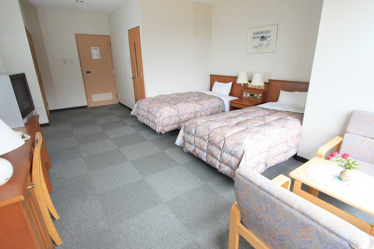 Chambre avec lits jumeaux, 2 lits une place, non-fumeurs (In-Room Toilet)