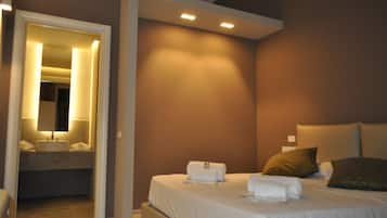 Quarto quádruplo | Wi-Fi de cortesia, roupa de cama