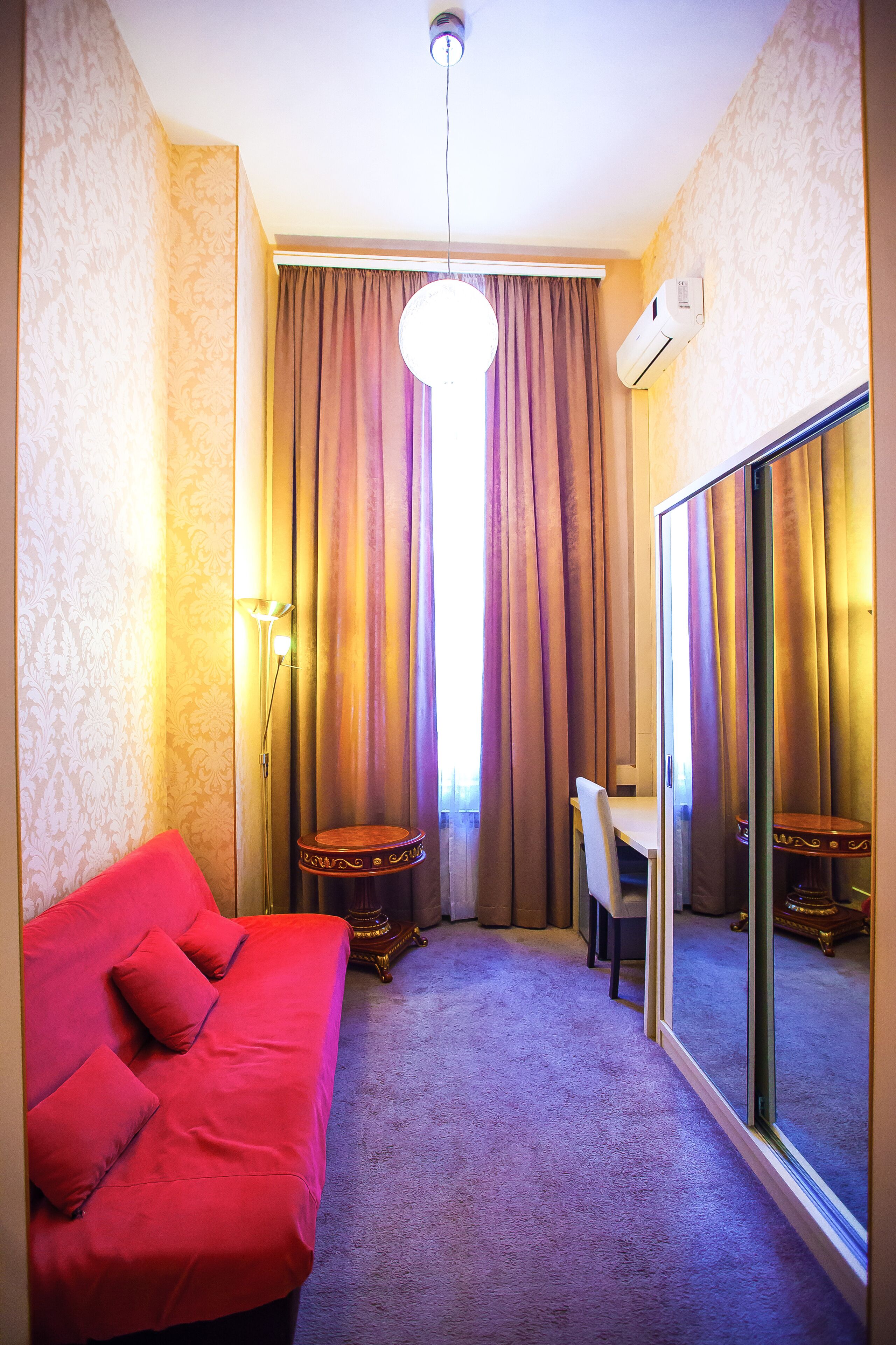 superior double room | living area | flat-screen tv