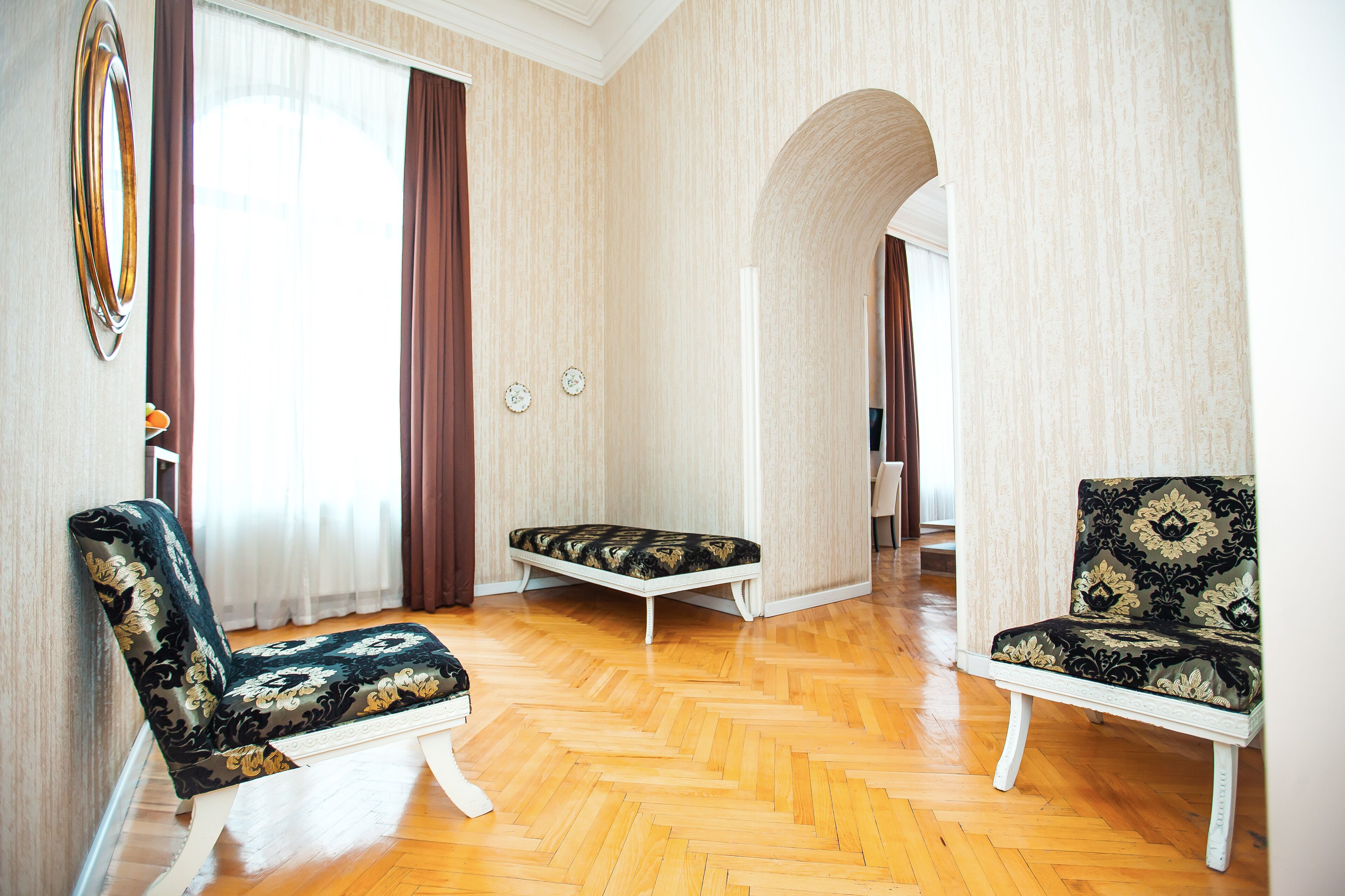 studio apartment | living area | flat-screen tv