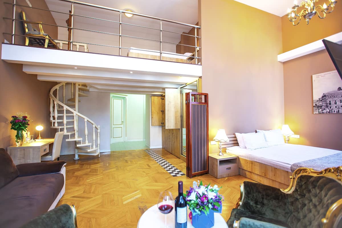 Family Apartment, Balcony, City View | In-room safe, desk, soundproofing, iron/ironing board