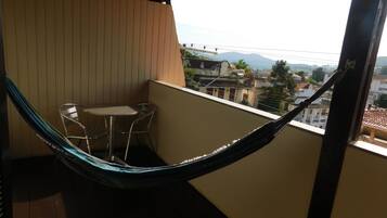 Minibar, desk, blackout drapes, iron/ironing board