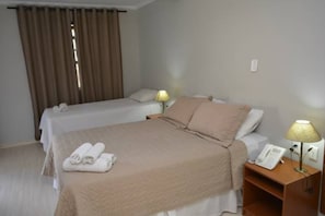 Minibar, desk, blackout drapes, iron/ironing board