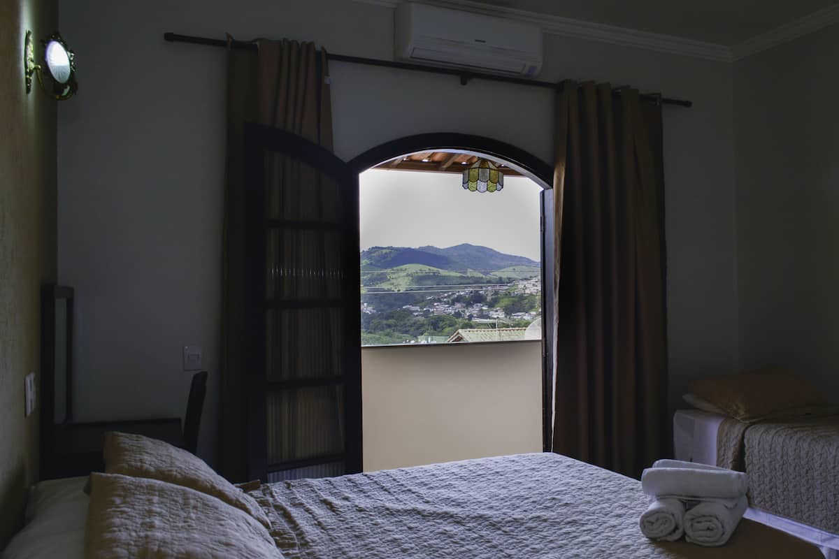 triple room | minibar, desk, blackout curtains, iron/ironing board