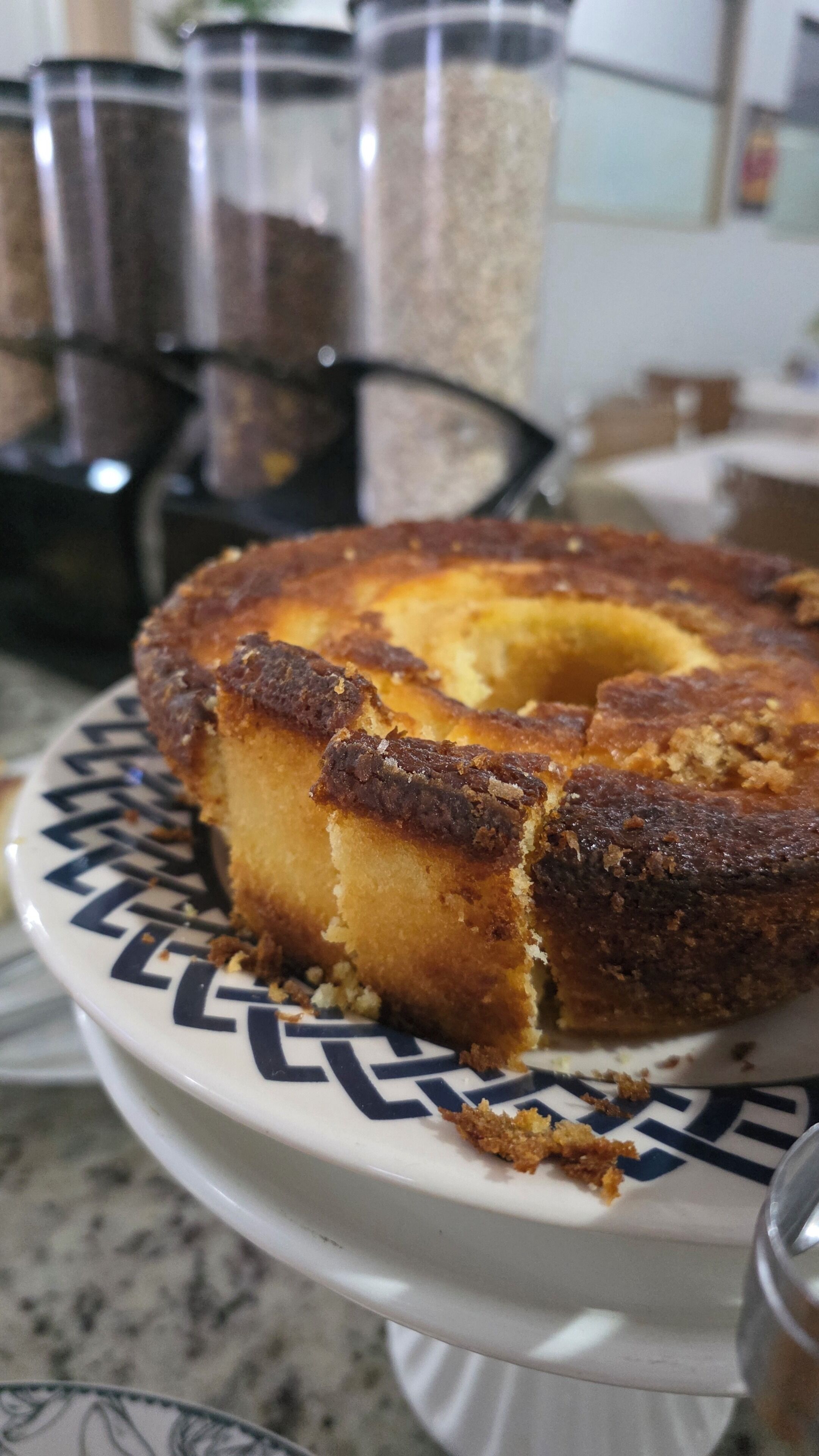 A cake on a plate with a patterned design.