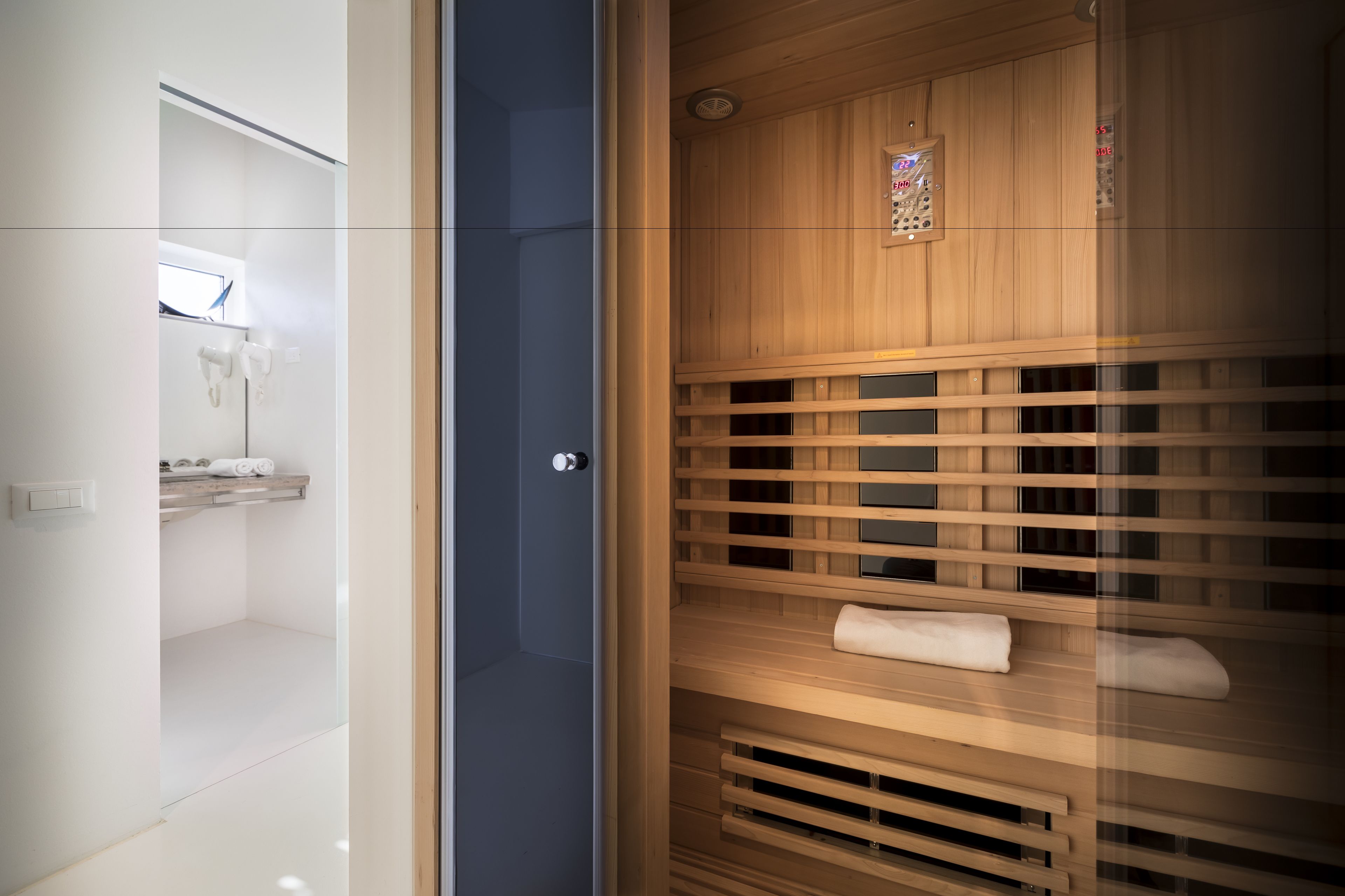 luxury suite, sauna, sea view | 1 bedroom, premium bedding, minibar, in-room safe