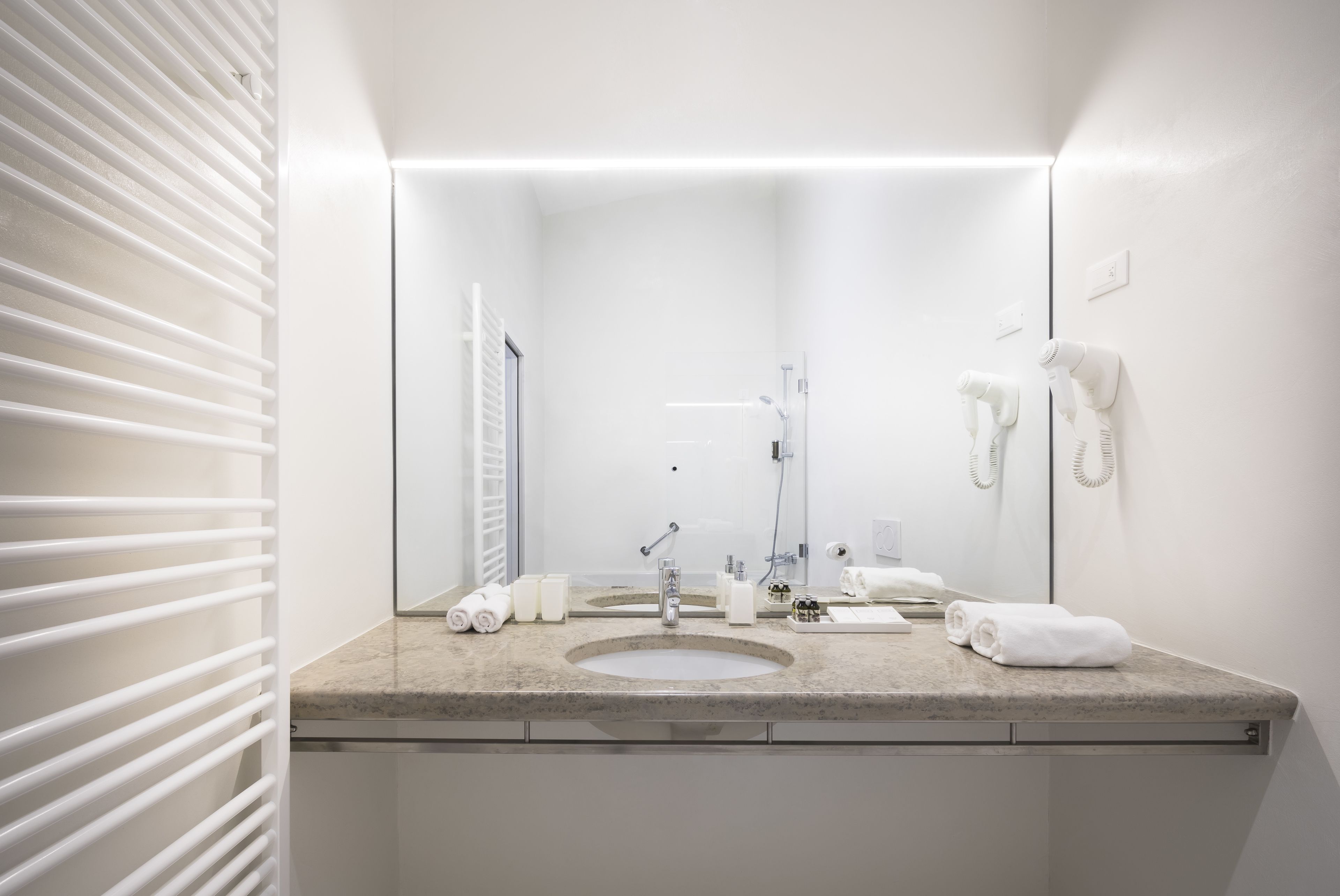 combined shower/bathtub, free toiletries, hair dryer, bathrobes