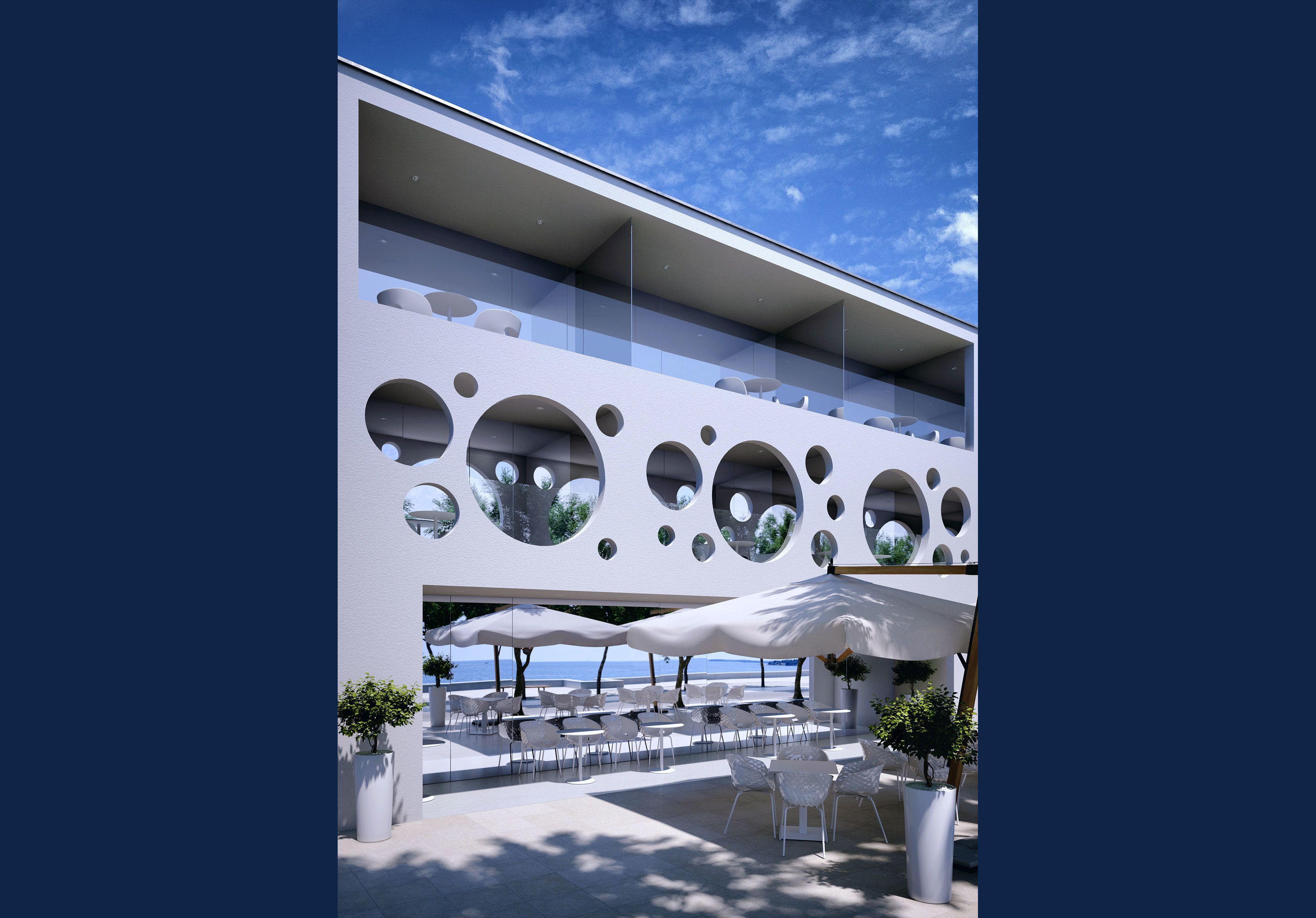 A modern building with circular windows and outdoor seating.