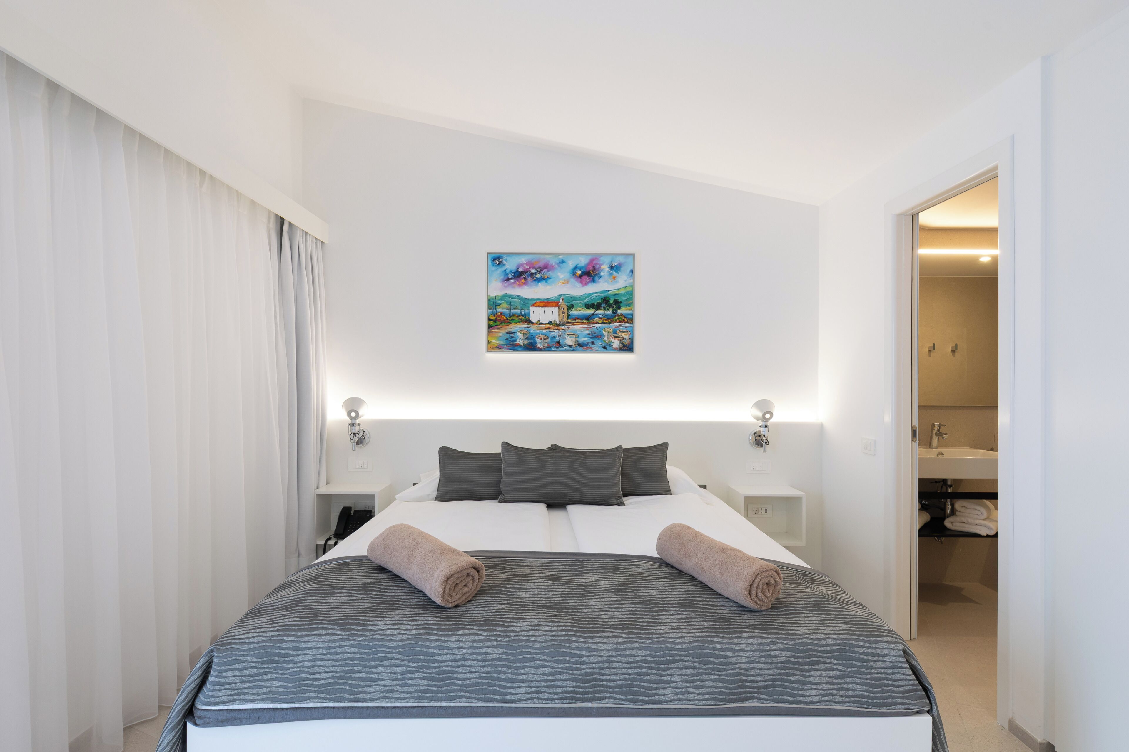 Junior Suite, Terrace, Sea View | Premium bedding, minibar, in-room safe, desk