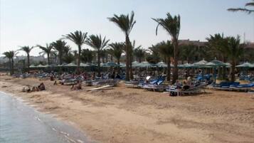 Private beach, sun loungers, beach umbrellas, beach towels