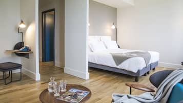 Minibar, coffres-forts dans les chambres, bureau, rideaux occultants