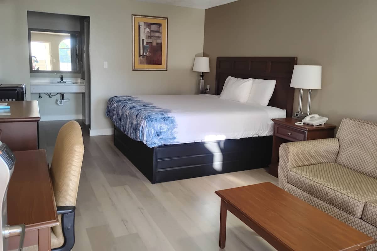Suíte, 1 cama King | 1 quarto, escrivaninha, Wi-Fi de cortesia, roupa de cama