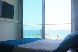 Quarto casal romântico, 1 cama de casal, vista para o oceano | Cofres nos quartos, berços grátis, Wi-Fi de cortesia, roupa de cama