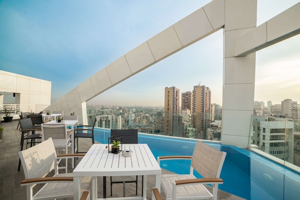 Seasonal outdoor pool, pool loungers