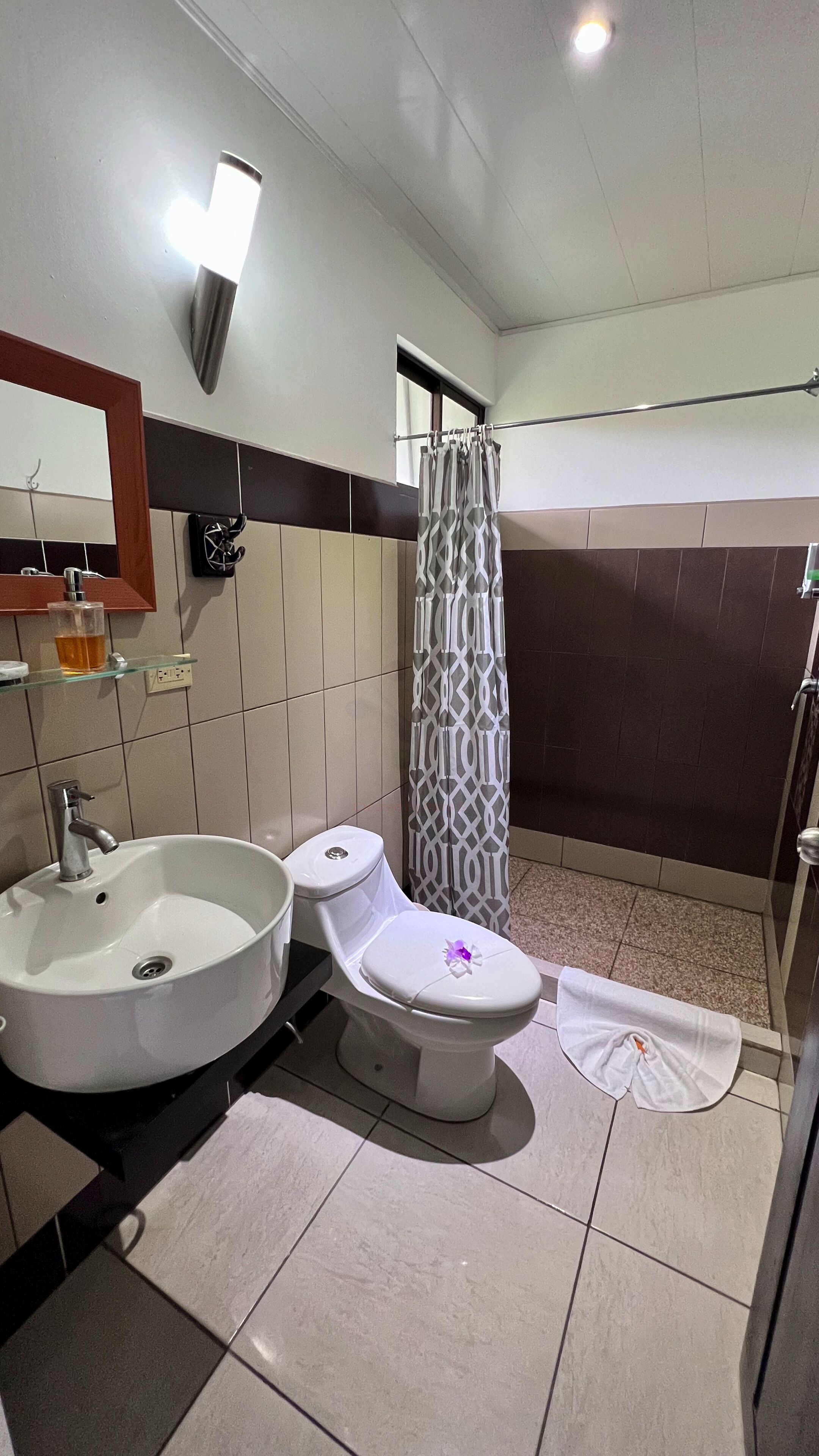 superior room with two double beds | bathroom | shower, designer toiletries, hair dryer, towels