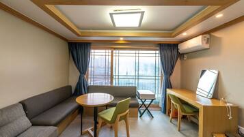 Family Two Rooms Mountain View | Living area | Flat-screen TV, heated floors