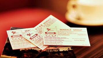 Business cards for Sendale Group hotels.