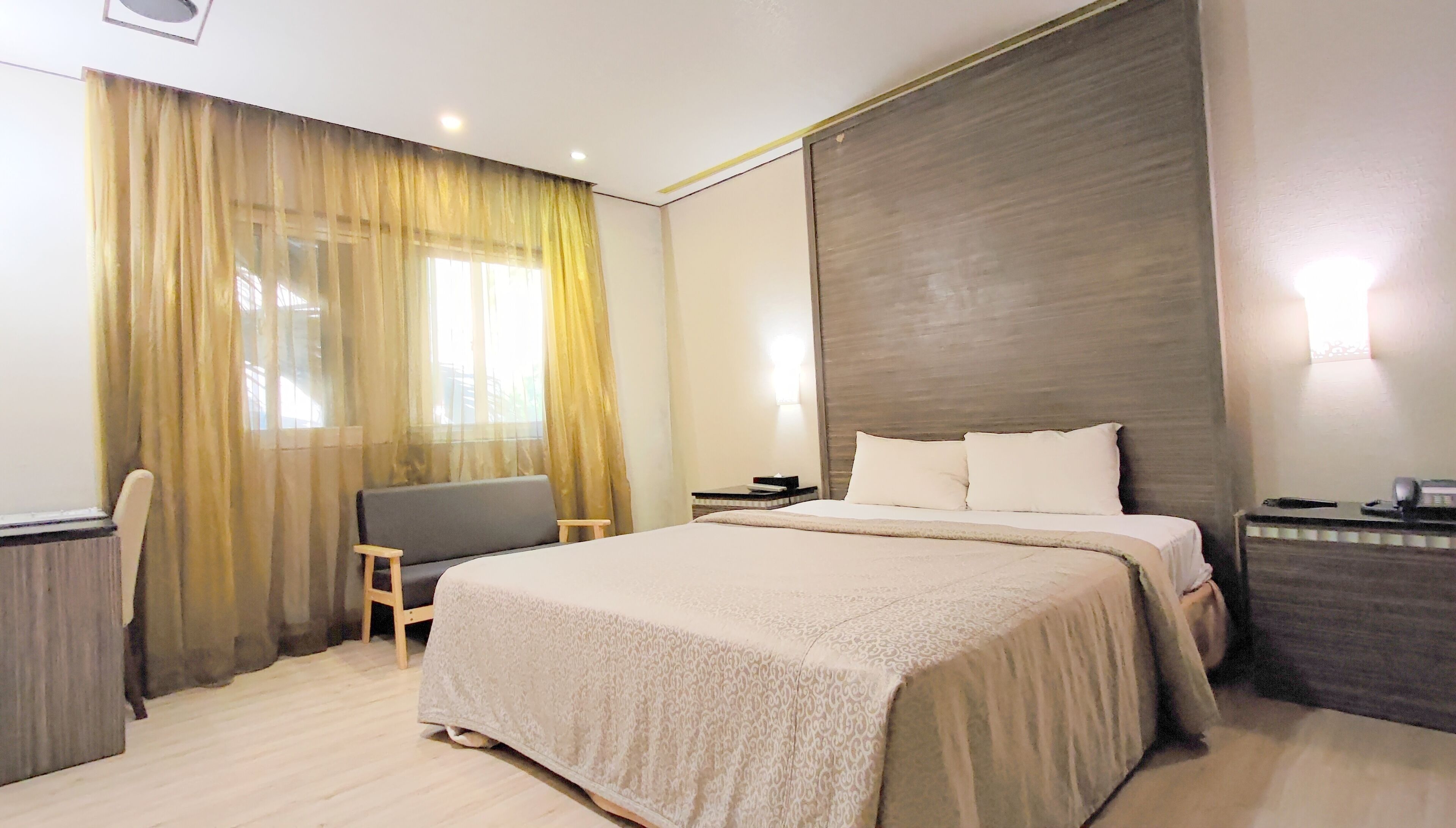 Down comforters, desk, blackout drapes, soundproofing
