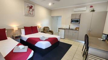 Deluxe Twin Room | In-room safe, desk, laptop workspace, iron/ironing board