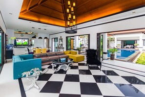 Villa Gelsomino  | Living room | 50-inch flat-screen TV with satellite channels, TV, DVD player - Jewels Villas Phuket (Si Sunthon)