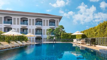 Outdoor pool, pool umbrellas, pool loungers