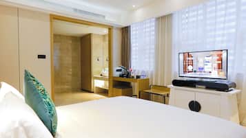 Premium bedding, down comforters, memory foam beds, in-room safe