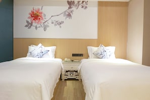 Chambre Supérieure avec lits jumeaux | Literie de qualité supérieure, couette en duvet d'oie